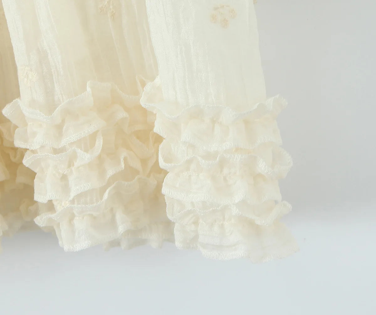 Sheer Dobby Tassel Tie Ruffle Hem Mini Dress