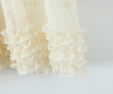 Sheer Dobby Tassel Tie Ruffle Hem Mini Dress