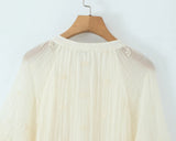 Sheer Dobby Tassel Tie Ruffle Hem Mini Dress