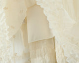 Sheer Dobby Tassel Tie Ruffle Hem Mini Dress