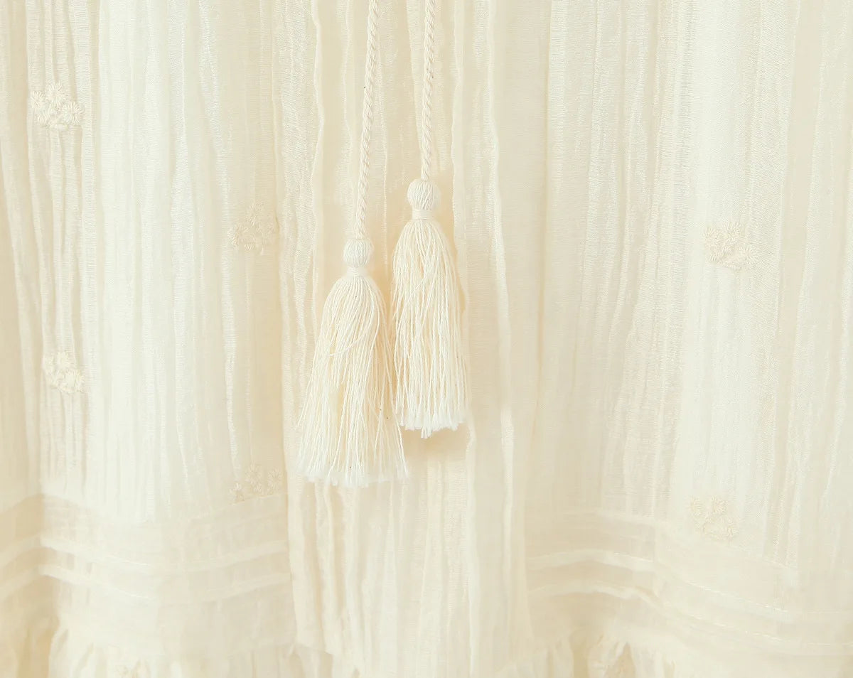 Sheer Dobby Tassel Tie Ruffle Hem Mini Dress