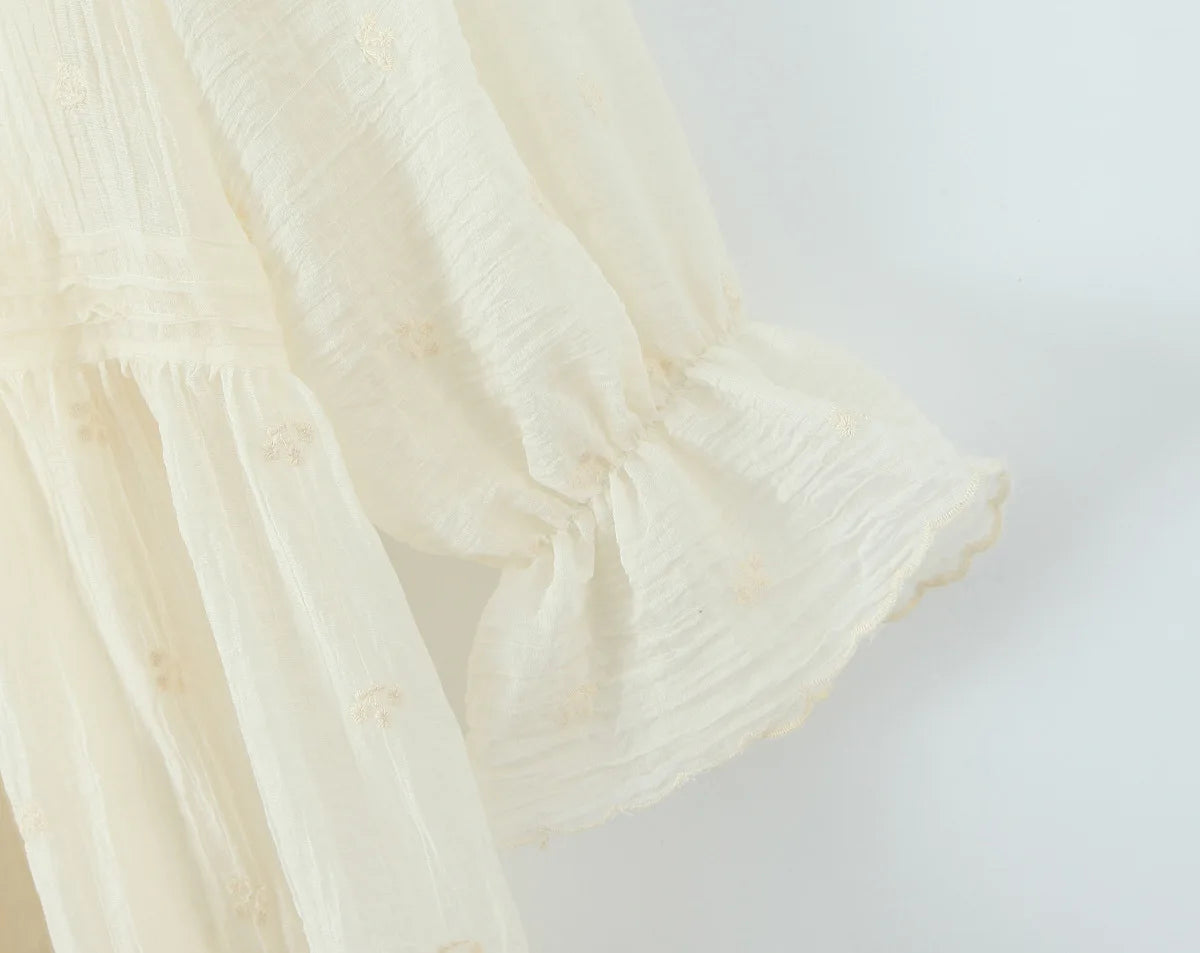 Sheer Dobby Tassel Tie Ruffle Hem Mini Dress