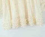 Sheer Dobby Tassel Tie Ruffle Hem Mini Dress